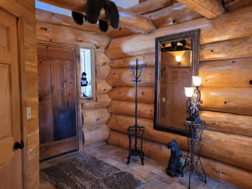 Beautiful handmade log home on private sand beach at the end of Big Bay, photo 4