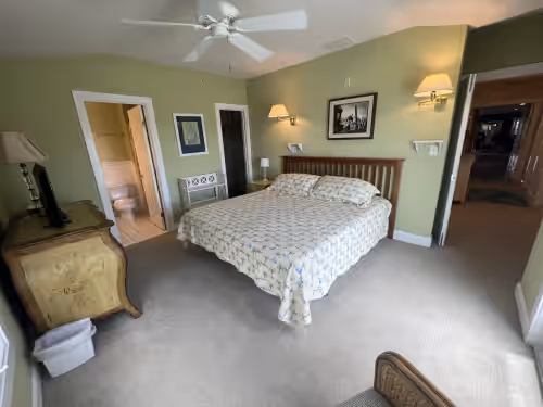 Main Suite King Bedroom with Private Bathroom at Beautiful Oceanside House in Fenwick Island DE with 12 Person Hot Tub