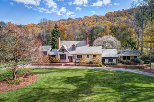 Historic 8 BR Tudor on 3 1/2 Acres.  Private estate and beautiful setting.