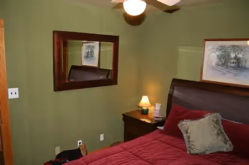 First Floor Berm #2- Queen Size Bed, bathroom across the hall at Large Modern Cabin with Hot Tub Tucked in Woods