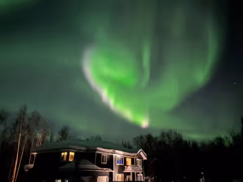 Northern Lights over the home in February at Paradise found! Beauty & Luxury- 20 min from Anchorage, HOT TUB, privacy