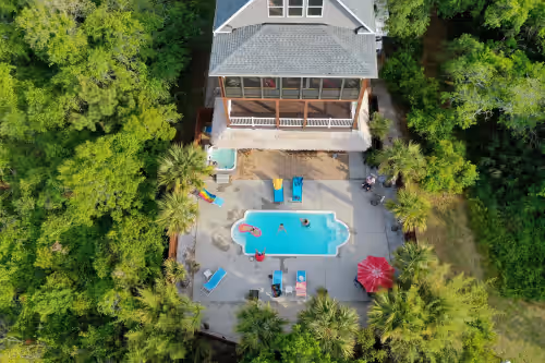 Private Getaway! Heated Pool, Hot Tub, & Tiki Bar! 5BD, 4.5BA, 5 min to beach, photo 4