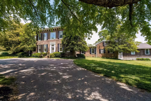 Exterior at Cheerful 8-Bedroom, 6-Bath Historic Mansion in Derby City