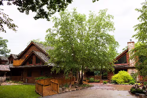 Front of Main House (left)and Pool House(right). at Kilbuck Creek ~ Indoor Pool & Jacuzzi ~ Sleeps 40