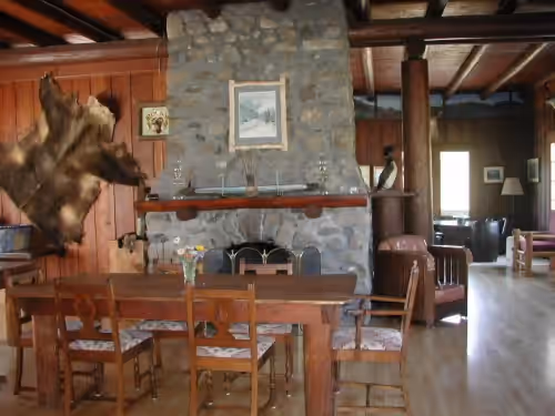 Large fireplace in lodge dinning room at Rising Wolf Ranch Family Reunions Corporate Get-Aways