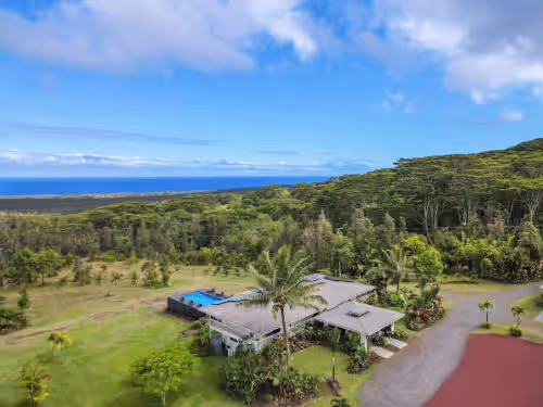 5-Acre Gated Retreat – Heated Pool & Spa, Horses, Orchard & Sweeping Ocean Views