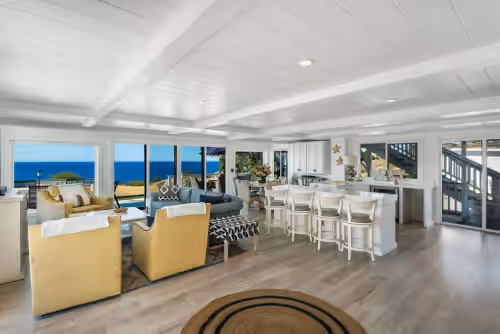 First-floor main house boasts a bright, airy living and entertaining area with an inviting ambiance. at NEW! Ocean View
