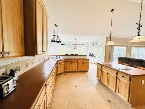 Spacious and bright kitchen complete with everything you need to prep meals! at Margaritaville Lakefront 6 Bed and 5 Bath,