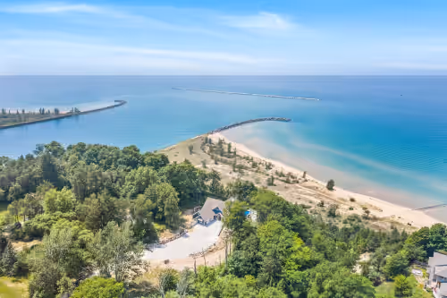 Aerial view at newly built house, beachfront, heated saltwater pool always 85