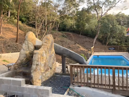A Quiet East End Retreat. Ocean view with a private pool and custom water slide, photo 4