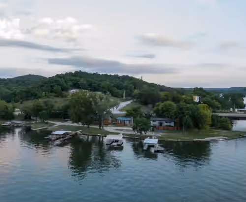 Private Island Retreat with 500' Level Lakefront & 3 Houses with Private Docks!!