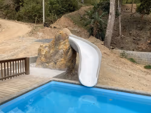 A Quiet East End Retreat. Ocean view with a private pool and custom water slide, photo 2
