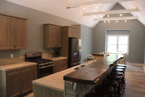 Gas stove, large breakfast bar, energy efficient dishwasher and refridgerator at Sleeps 30! Large Pool, Hot Tub, Volleyball,