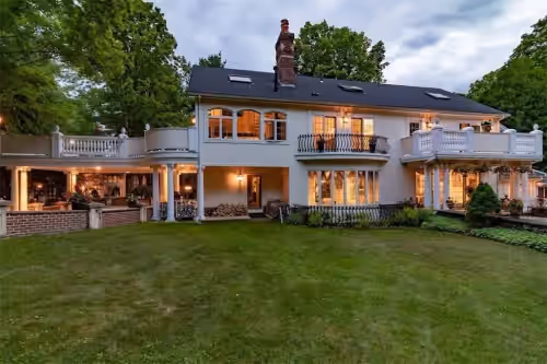 The house lit up as night approaches at Your Own Private Luxury Resort