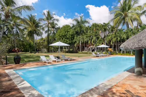 Walk to the beach from Tropical luxury Villa.