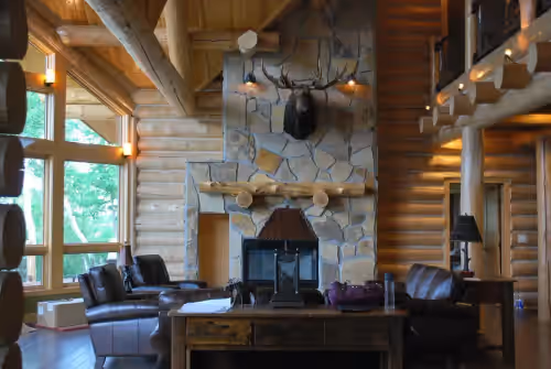 Great Room offers an inviting, cozy place to enjoy your family and friends… at Private, Exclusive Lodge on Woman Lake with