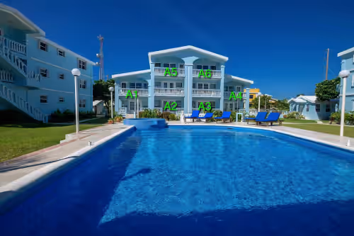 Building A sits behind the pool at SUNSET BEACH RESORT BELIZE