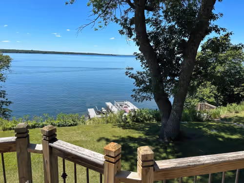 View from deck, the docks at Beautiful lakefront Property on West Battle Lake with stunning views