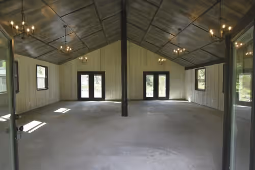 Open concept with vaulted ceiling in the barn. The size is 29 ft x 26.4 ft. at Private Farmhouse Estate w/ Barn Wedding,