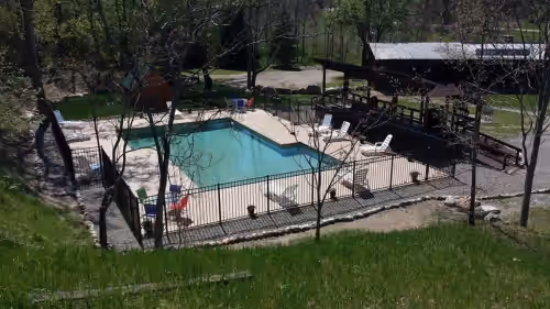Enjoy a swim in our heated swimming pool! at Rustic Western Themed Hotel with amazing ameneties! Host your gathering with us