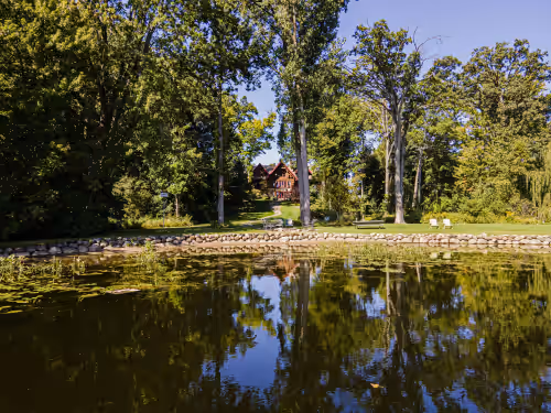 Log Cabin Mansion fronting Strawberry and Bass Lake with large oversized suites, photo 3