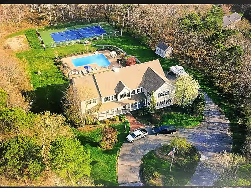 Luxurious 7BR Estate Includes - Tennis Crt, Pool, Hot Tub, Home Theater, & Gym!
