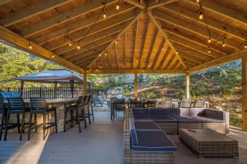 Outdoor dining at 3 homes in one, pool, outdoor kitchen, wk to beach, great for multiple families
