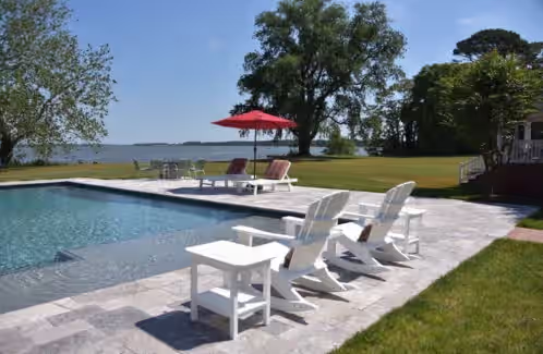 Amazing pool with tanning ledge for loungers at Chesapeake Bay Large Beautiful Waterfront Estate! "Belle Aire Landing"