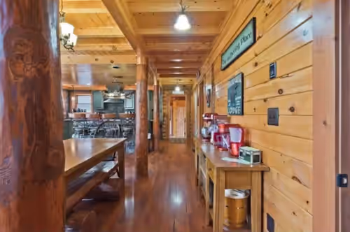 Main Floor Hallway to Kitchen at Luxury Lakefront Home On 155 Private Acres: Family Reunions, Weddings, Events