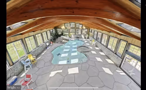 Pool at Lodge style home w/ INDOOR pool/spa, 2 miles to the beach, onsite canal access