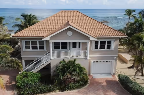 Coco Kai Beach Front Villa with Heated Pool and Private Dock
