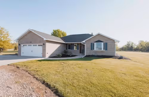 Peaceful neighborhood OUTSIDE of Kearney and one of the LARGEST homes available.