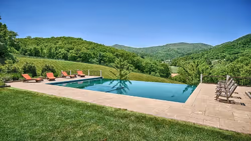 Infinity pool and hot tub. at BREATHTAKING Luxury Estate with sweeping views on 40 Acres, NEAR ASHEVILLE