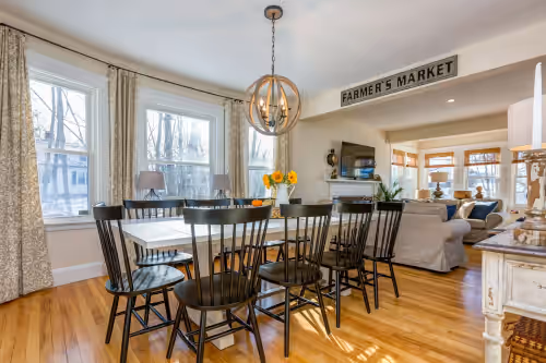 Spacious Dining room can seat up to 12 at 96" dining table. 14 matching chairs. at BEAUTIFULLY Renovated: 6 min to DT