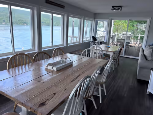 Dining area room for 18 people with spectacular view of the Bluff at Fall in love with Keuka at Keuka Kara