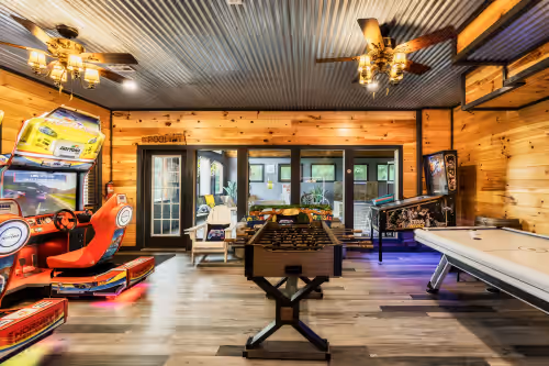 Game room next to pool *Star Wars pinball has been replaced with a Marvel one! at Spacious Mountain Hideaway: Private