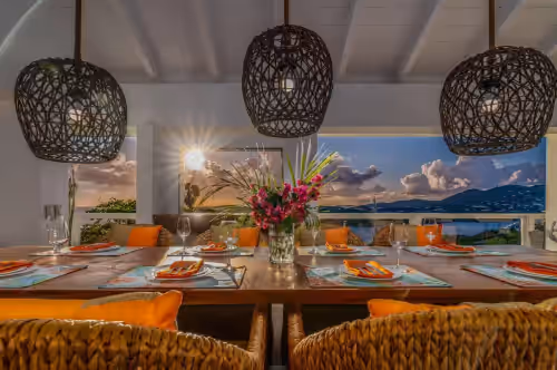 The gorgeous outdoor dining area! A perfect place to watch the sunsets! at Sunset Sanctuary: Gorgeous 5br w/huge pool/deck &