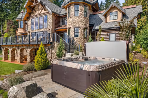 Terrace/patio at Lakefront Luxury Castle w/ Hot Tub
