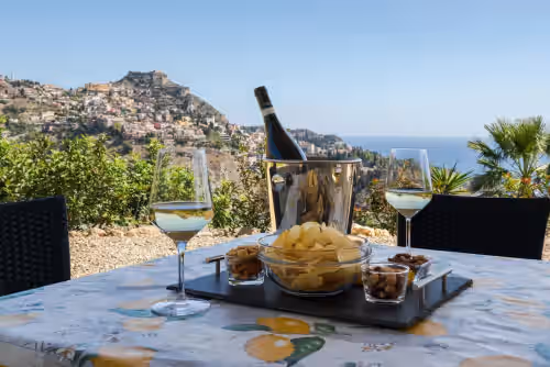 Terrace view of Taormina and the sea at Private Villa with swimming pool for up to 28 guests