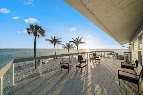 "Sunset Balcony" best view on property. Shared balcony space for the two upstairs units 9 & 10 at Banana River Resort