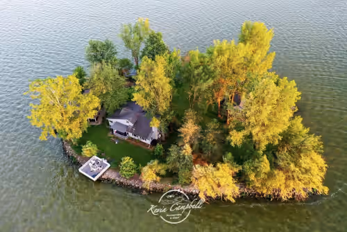 Private Island! Includes house, cottage, boat docks, best sunsets on Indian Lake