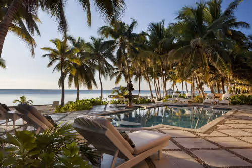 The pool has a table inside for refreshments. at Casa Tortuga