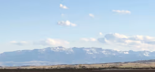 Mountain Range View from the Z3 porch and backyard at Large, Private & Charming retreat is ultimate upscale stay near Cody,