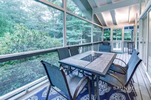 Outdoor dining at Beautiful, fully updated, Spacious East Hampton home minutes from town and beach