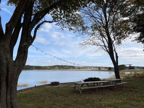 High tide in fall at Charming Waterview Victorian w/Cottages near beach, harbor & town