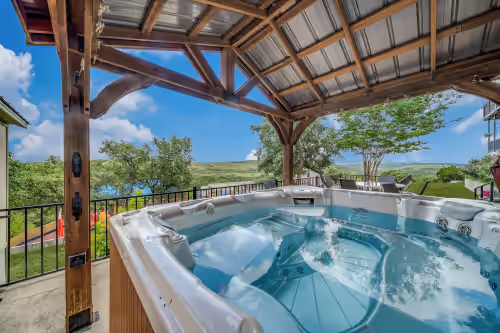 Outdoor spa tub at Heated Pool, Game-room Clubhouse, Hot tub, Playground, Views, Additional Cottage
