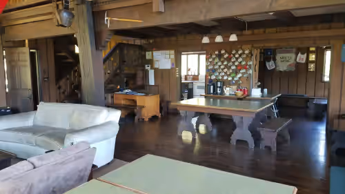 Main lodge gathering space, coffee/tea station, desk. at European Alpine Lodge with Stunning Mountain Views- Room for the