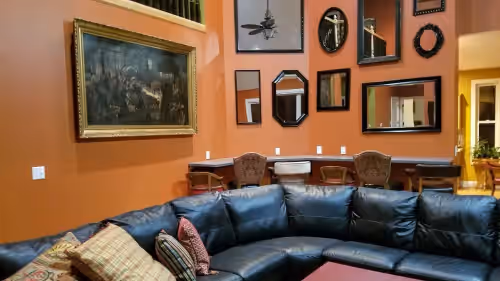 Living room bar with extra seating for dining or TV watching at Private Country House near Lake Geneva, Como and Williams Bay