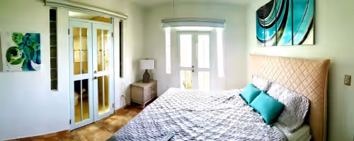 Coral room with water splash and a seaturtle paint at Steps from Water & Restaurants, right at Jobos beach!, Great Location
