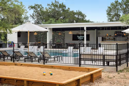 Outdoor pool, pool bar and bocce ball for you to enjoy during your stay. at The Cedars Ranch: Full Buyout of TX Hill Country